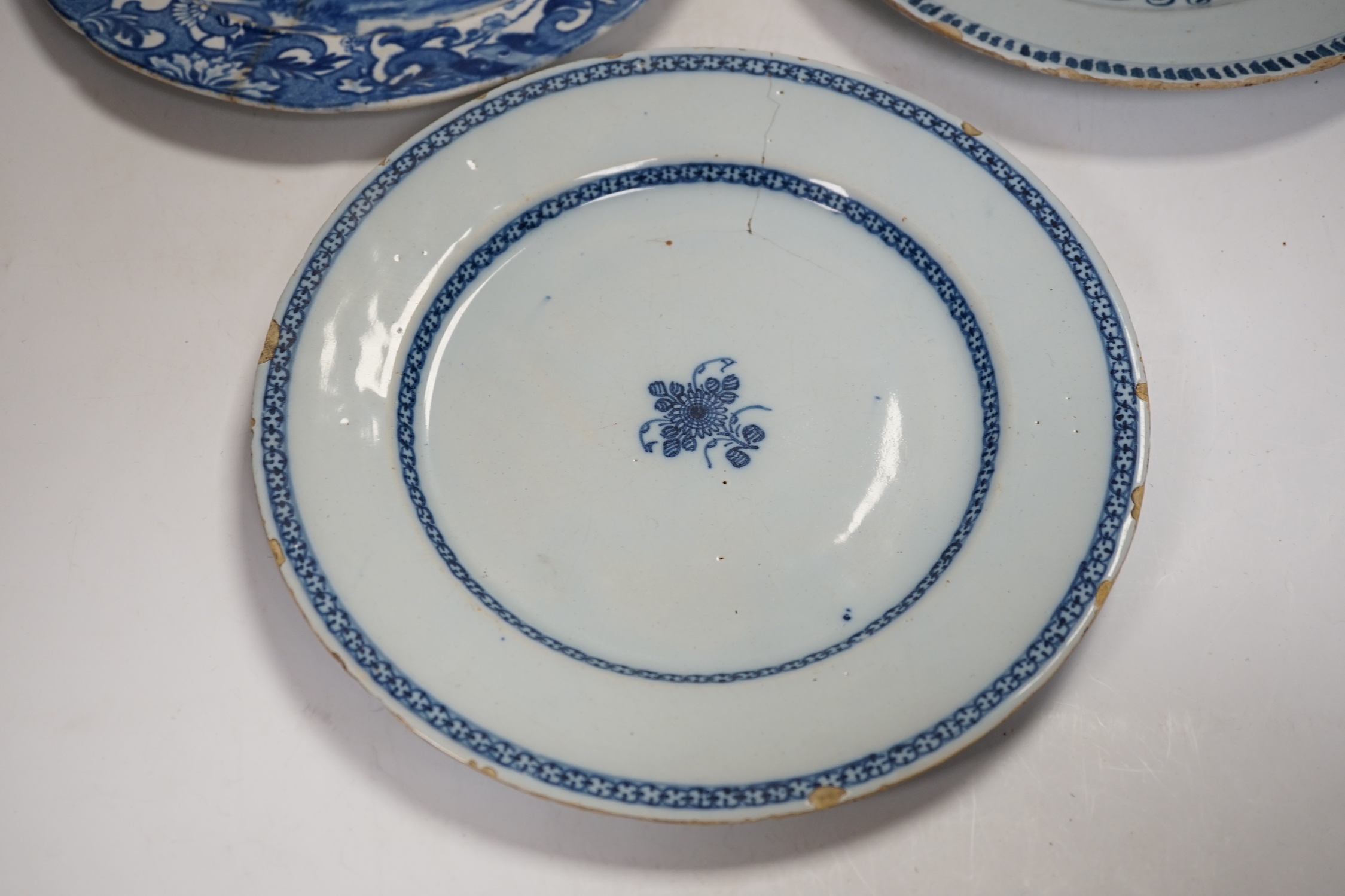 Two 18th century Delft plates and a 19th century Masons ‘Crown Inn’ plate-24cm diameter